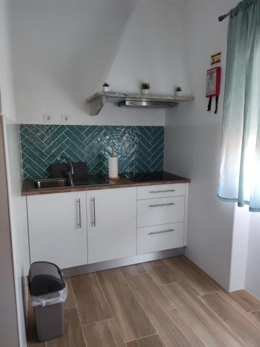 Kuchyň nebo kuchyňský kout v ubytování AL Casa Mia