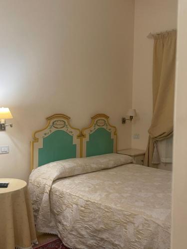Postel nebo postele na pokoji v ubytování Casa Piermarini