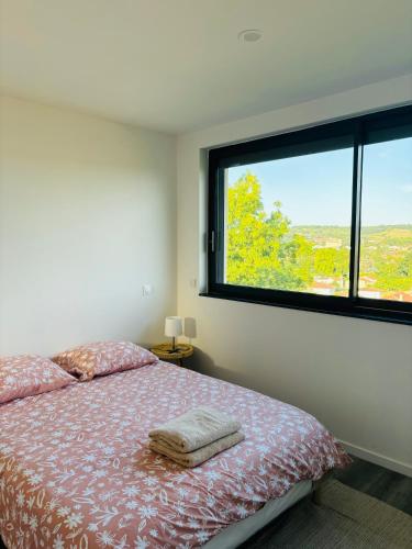 Ένα ή περισσότερα κρεβάτια σε δωμάτιο στο Jolie duplex dans le centre d Auch
