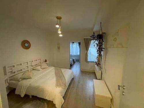 Postel nebo postele na pokoji v ubytování E&L Appartement