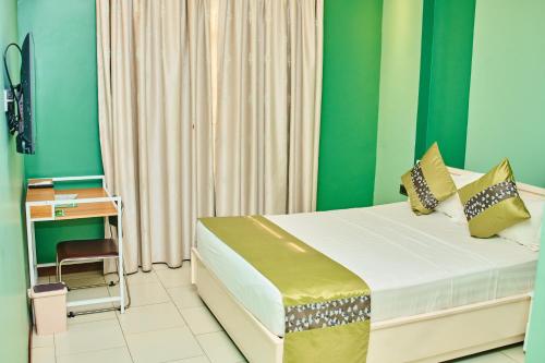 Postel nebo postele na pokoji v ubytování Hotel Amaranth