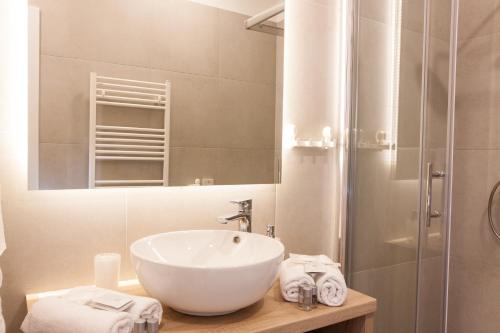 Ванна кімната в Tesla Boutique Apartments & Rooms