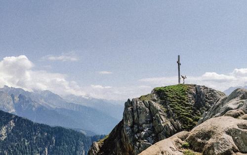 a cross on the top of a mountain at SchönBerg hotel b&b in Rio Bianco