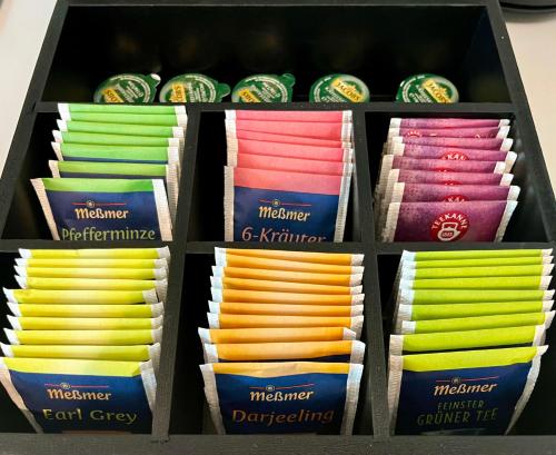 a box of different colored chopsticks at Come2Stay - Pinneberg Zentral in Pinneberg