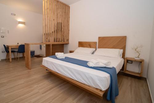 Postel nebo postele na pokoji v ubytování Pietra Bianca