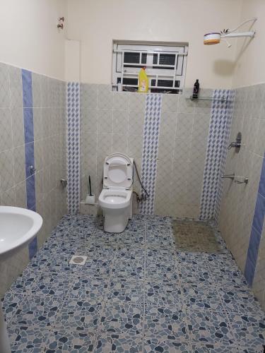Koupelna v ubytování Gloria House