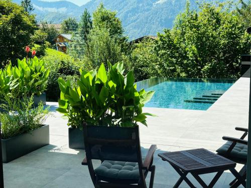 La alberca dentro o cerca de place2be - with infinity pool