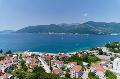 an aerial view of a town next to a body of water at Coast line apartment Mika in Tivat