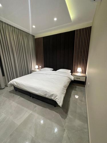 Ένα ή περισσότερα κρεβάτια σε δωμάτιο στο Chic Apartments For Rent ave2-9