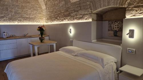 Katil atau katil-katil dalam bilik di B&B Città dei Fiori