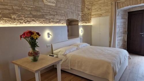 Katil atau katil-katil dalam bilik di B&B Città dei Fiori