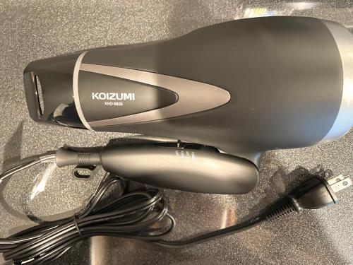 a hair dryer sitting on top of a table at New三軒茶屋ハウス 渋谷まで電車5分 三軒茶屋駅徒歩6分 2023年フルリノベ戸建 in Tokyo