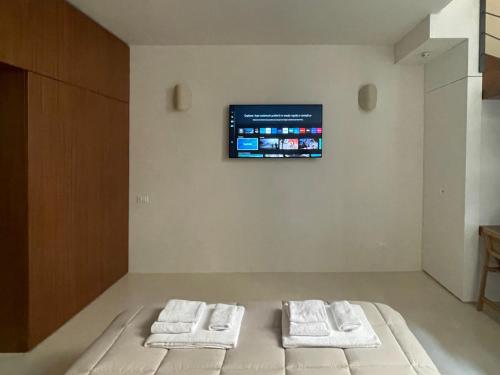 Ένα ή περισσότερα κρεβάτια σε δωμάτιο στο Duomo Studio Elegance and Comfort 1 Minute from the Duomo