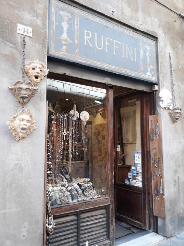 a store front of a building with a window at Hotel Minerva in Siena