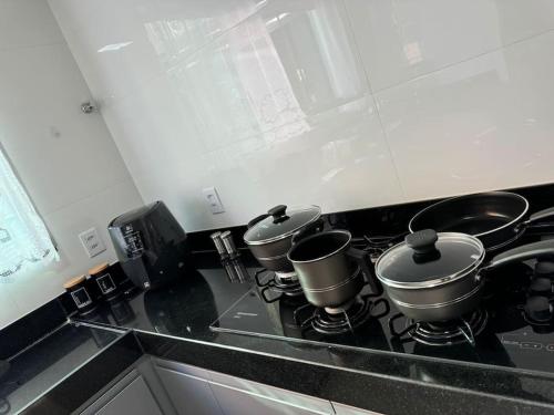 Kuchyň nebo kuchyňský kout v ubytování CASA MARAVILHOSA COMPLETa