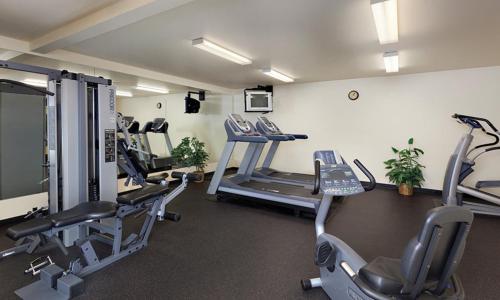 a gym with several tread machines in a room at WorldMark Solvang - Studio Sleeps up to 2 in Solvang