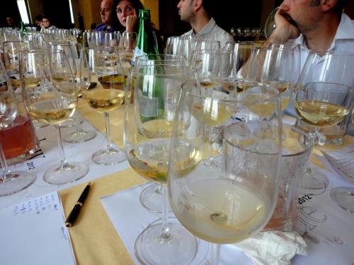 a bunch of wine glasses sitting on a table at Tenuta Montelaura in Forino