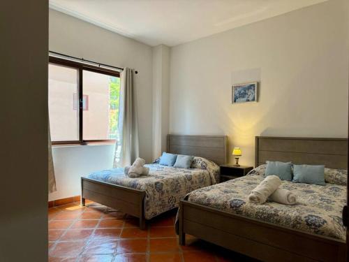 Katil atau katil-katil dalam bilik di Spacious No Stairs Gated Community Pool Parking Gym