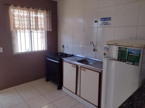 Η κουζίνα ή μικρή κουζίνα στο A 6 km do shopping sul Valparaiso, 7