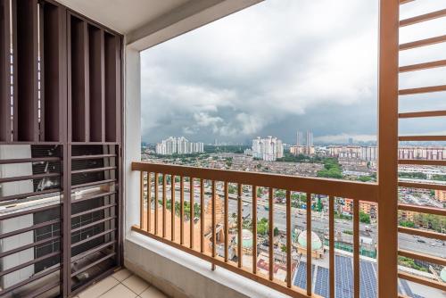 a balcony with a view of a city at Resort Suites Pyramid & Lagoon in Petaling Jaya