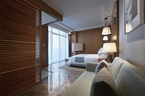 Zhoushan Yibo Hotelにあるベッド