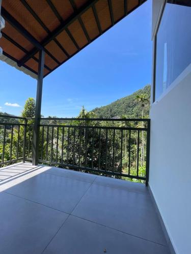 Μπαλκόνι ή βεράντα στο Nutmeg shades Cottage