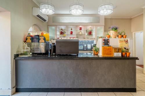 a bar in a store with a counter top at ATKV Goudini Spa in Rawsonville