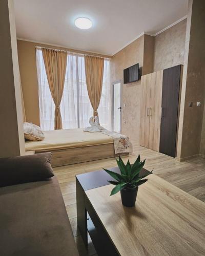 Postel nebo postele na pokoji v ubytování Апартаменти за гости Кедър