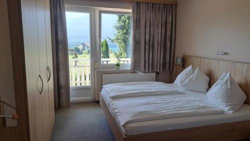 Postel nebo postele na pokoji v ubytování Haus Panorama