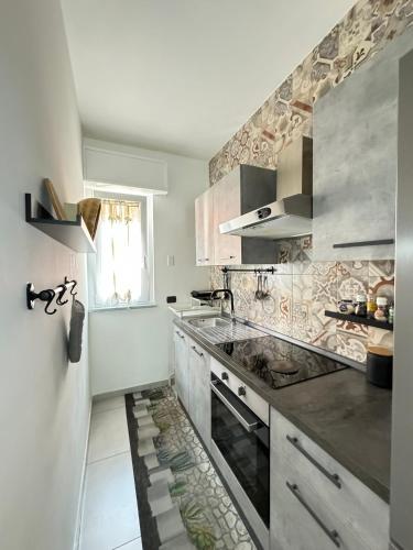 Η κουζίνα ή μικρή κουζίνα στο CDF Apartment Milano