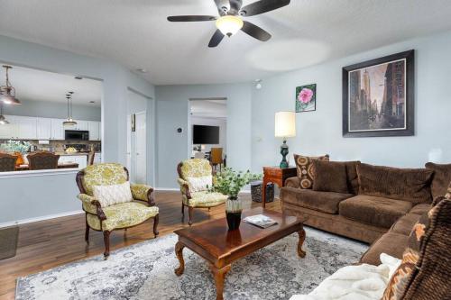 a living room with a couch and chairs and a table at RARE FIND! Heatd Pool Spa GameRoom Fall Special! in San Antonio