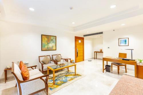 a living room with a couch and a table at Fortune Park Lake City, Thane - Member ITC Hotels' Group in Thane