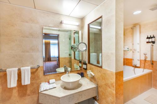Ένα μπάνιο στο Fortune Park Lake City, Thane - Member ITC Hotels' Group