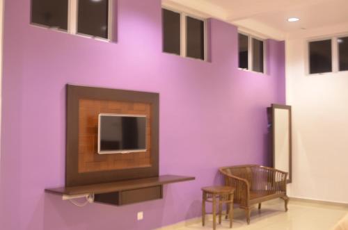 LSH Rest Houseにあるテレビまたはエンターテインメントセンター
