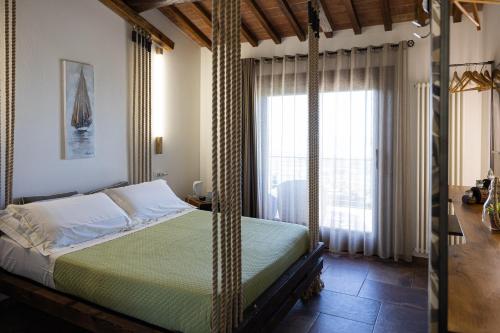 a bedroom with a bed in a room at Di Colle in Colle - Agriturismo in Passignano sul Trasimeno