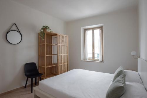 Ένα ή περισσότερα κρεβάτια σε δωμάτιο στο Palazzo BordiLand 1