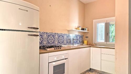 Η κουζίνα ή μικρή κουζίνα στο Villa in Riva al Mare