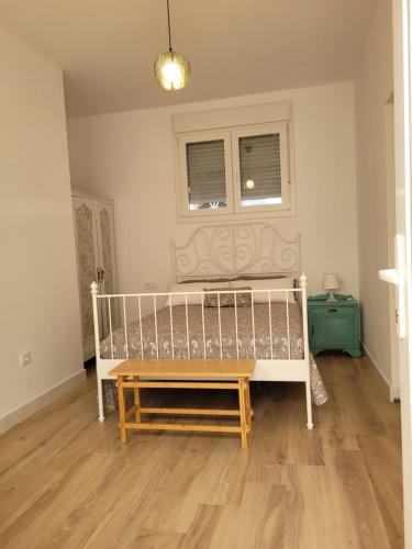 Ένα ή περισσότερα κρεβάτια σε δωμάτιο στο Apartamento con WiFi y aparcamiento privado