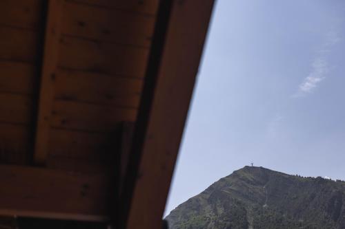 a view of a mountain from a window at Le Rioumajou 1 - Grand T6 - Piscine - Centre St Lary in Saint-Lary-Soulan