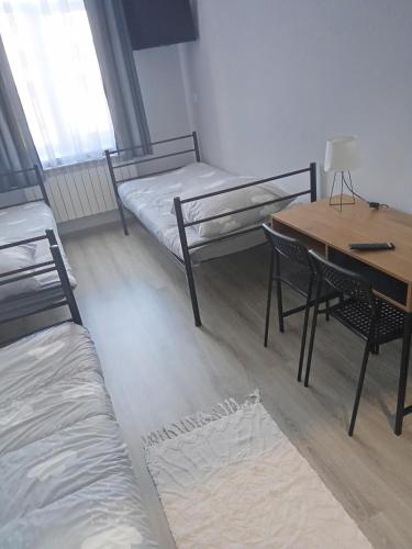 Postel nebo postele na pokoji v ubytování Noclegi 24h Przemyśl