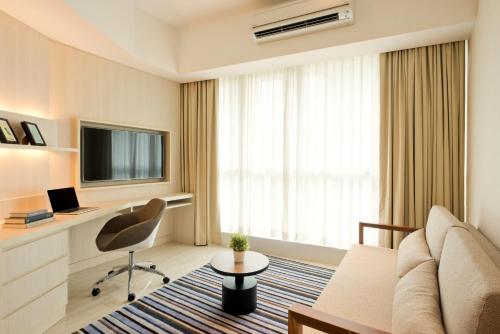 Televisyen dan/atau pusat hiburan di Oasia Suites Kuala Lumpur by Far East Hospitality