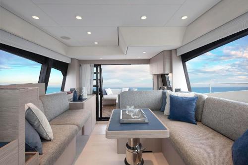 a living room with a couch and a table at Santa Barbara in Podstrana