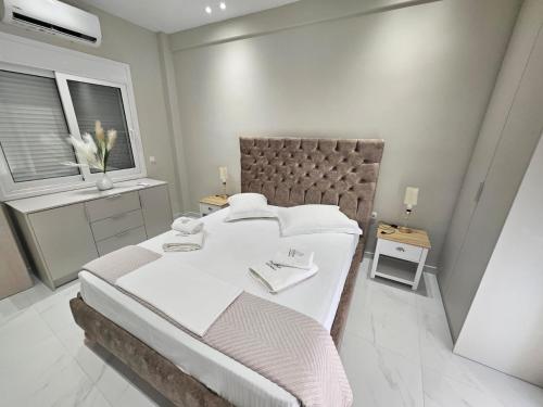 Ένα ή περισσότερα κρεβάτια σε δωμάτιο στο Agora luxury Flat 3