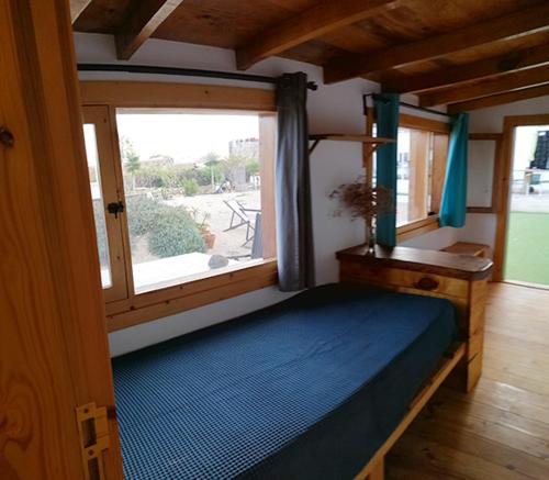 Postel nebo postele na pokoji v ubytování Tenerife Climbing House
