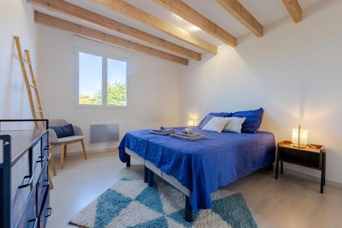 En eller flere senge i et værelse på Maison Élégante avec Jardin I Centre de Cognac