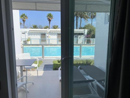 Bazén v ubytování Descanso junto a las dunas nebo v jeho okolí