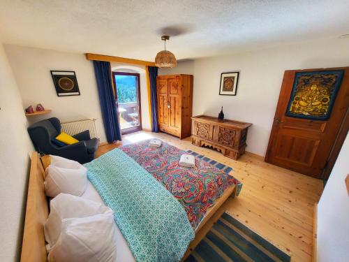 Postel nebo postele na pokoji v ubytování Yoga Resort AlpenRetreat