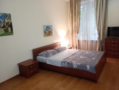 Katil atau katil-katil dalam bilik di Central Elegant Apartment