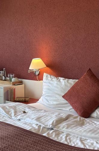 Ein Bett oder Betten in einem Zimmer der Unterkunft Hotel Säntis Teufen