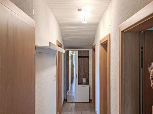 a hallway leading to a room with a hallway at Apartment Eleonore by Interhome in Litzlberg